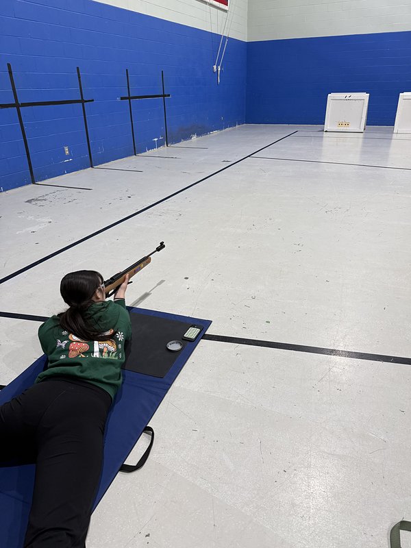 A cadet in the prone position on the marksmanship range
